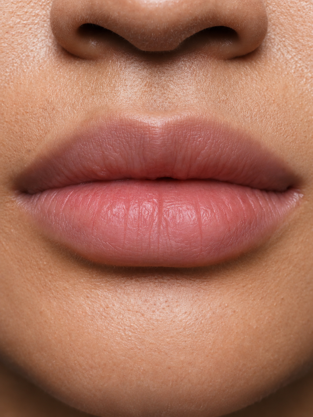 Before: Lips before and after one swipe of Damn Juicy Lip Oil